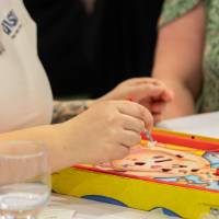 person playing Operation game